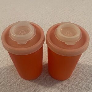 Set of Vintage-Tupperware Orange salt/pepper shakers.